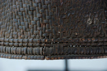 A thickly woven rain hat close up showing tight weaving