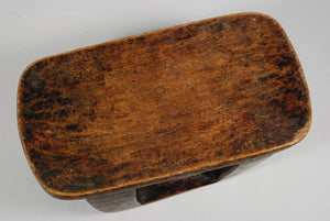 the top of a East African stool